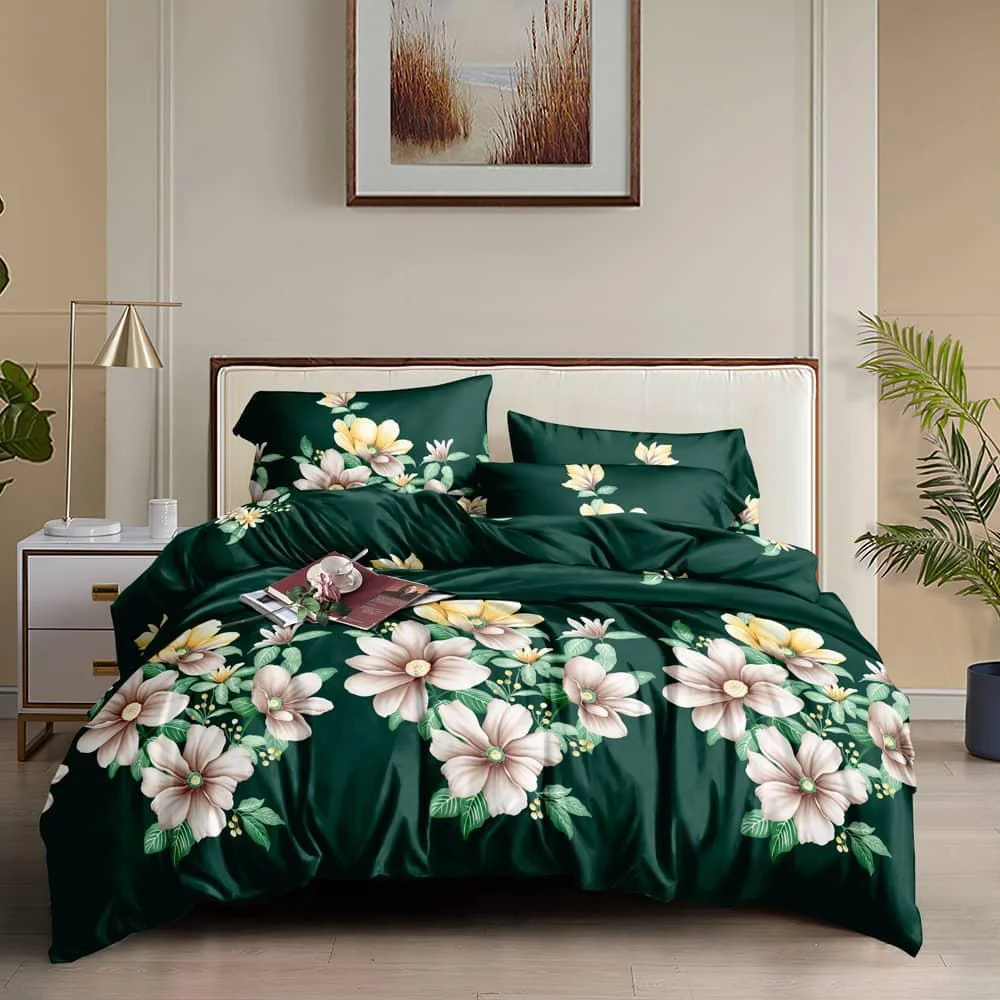 Green floral bedding on a bed