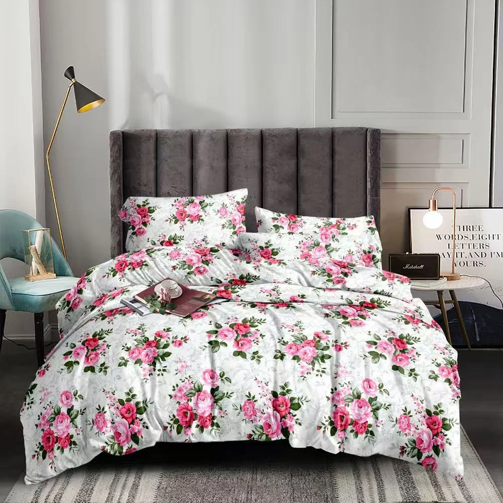 Pink floral bedsheet design on a bed