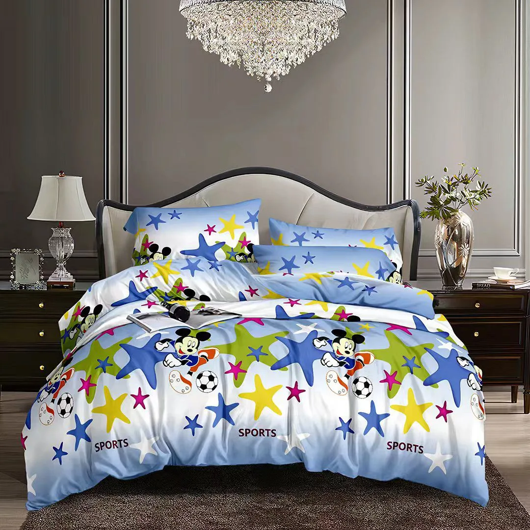 Blue and white cartoon print bedsheet on a bed